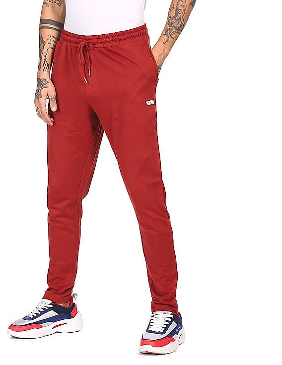 Buy Flying Machine Men Red Mid Rise Solid Track Pants  NNNOWcom
