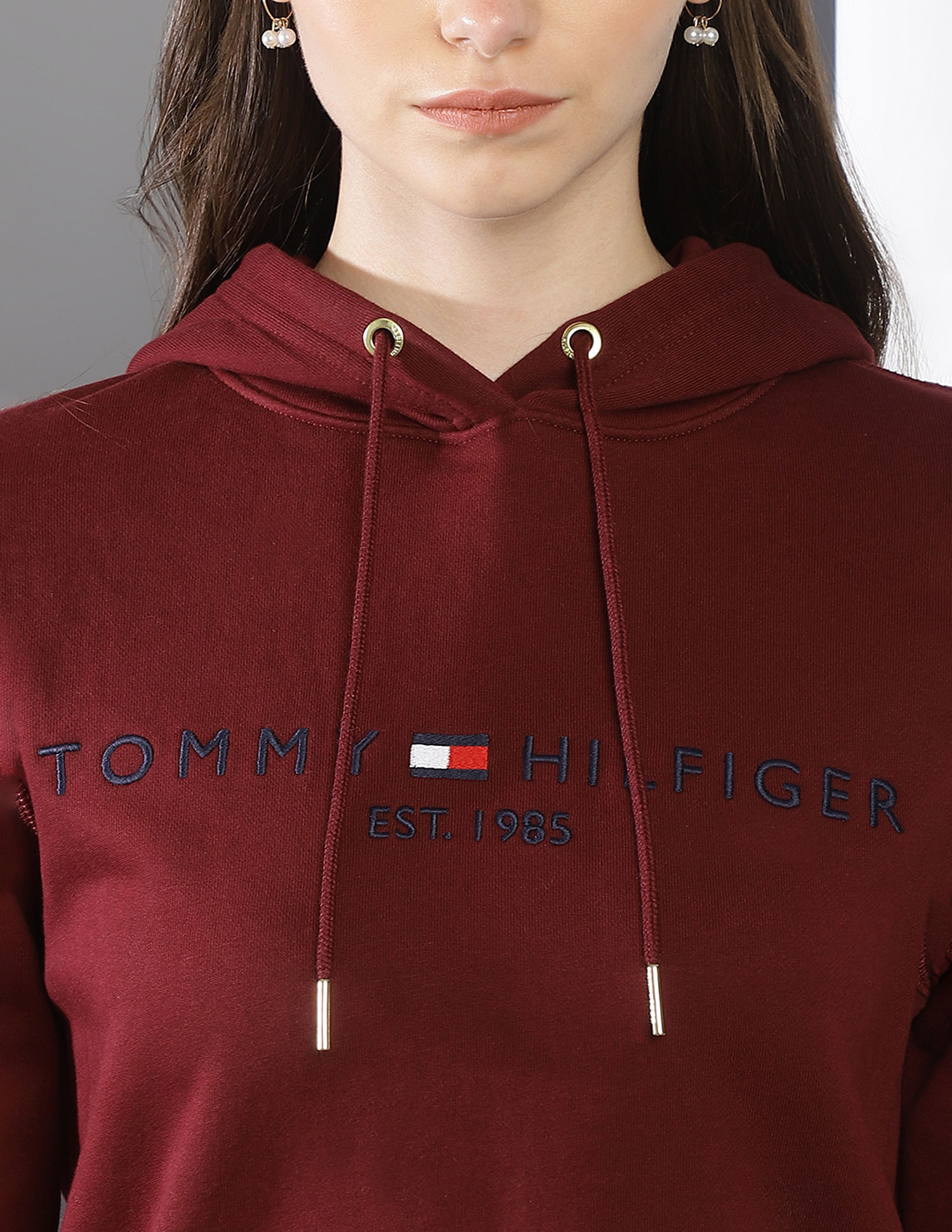 Buy Tommy Hilfiger Women Maroon Essential Hooded Solid Sweatshirt 