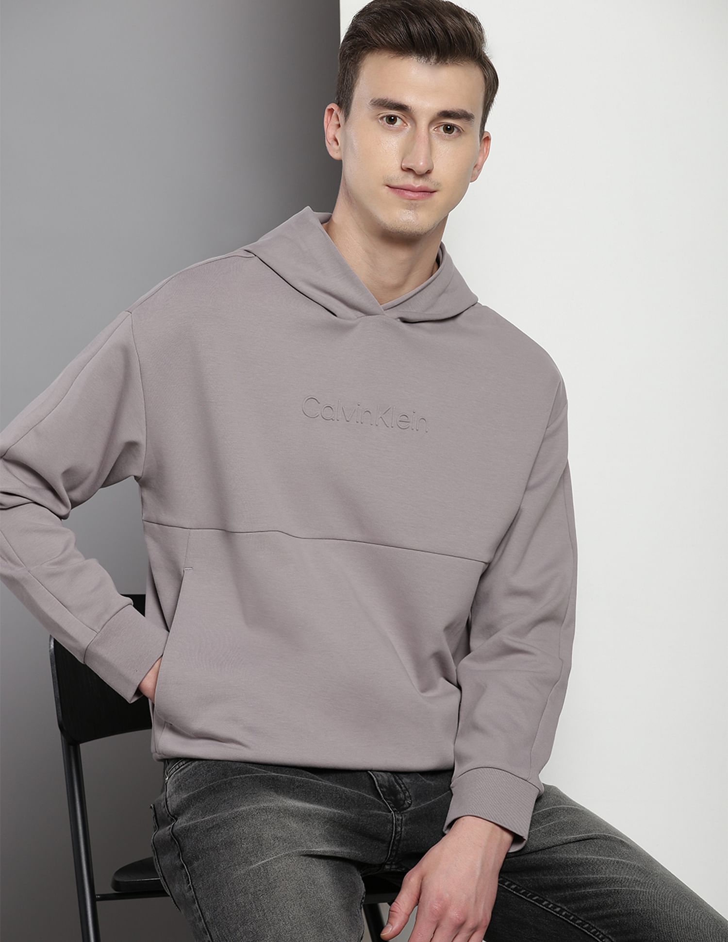 Embossed logo hooded sweatshirt on sale