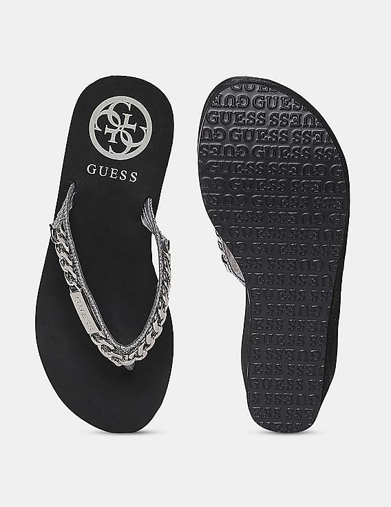 Guess black wedge hot sale flip flops