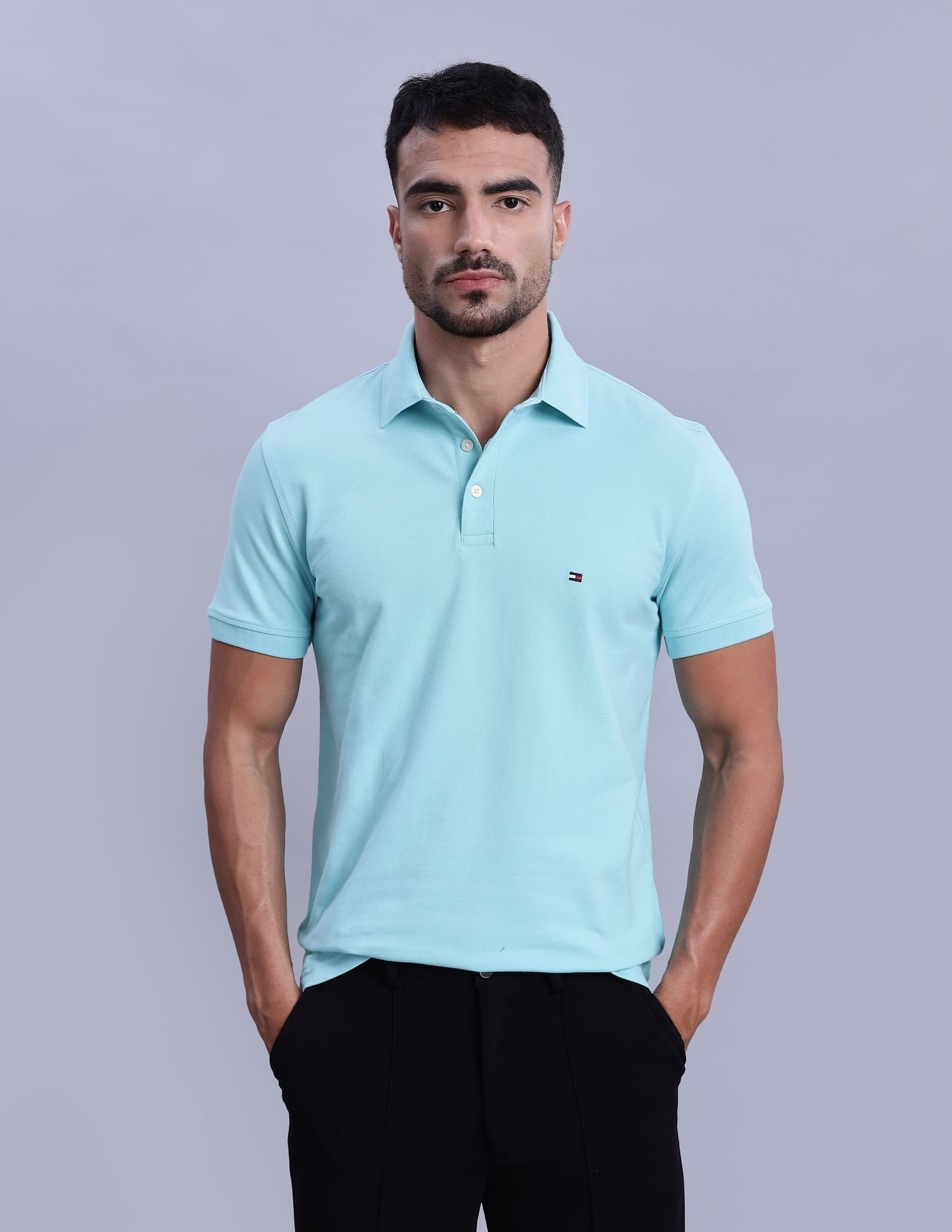 Tommy Hilfiger Mens Blue Solid Polo Shirt