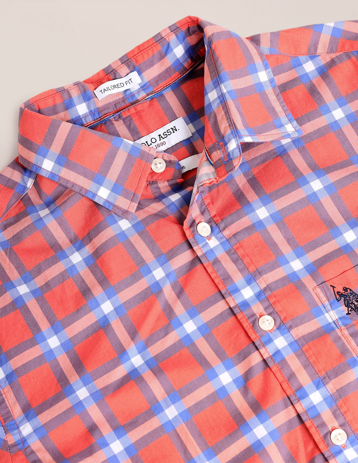 red and orange checkered shirt