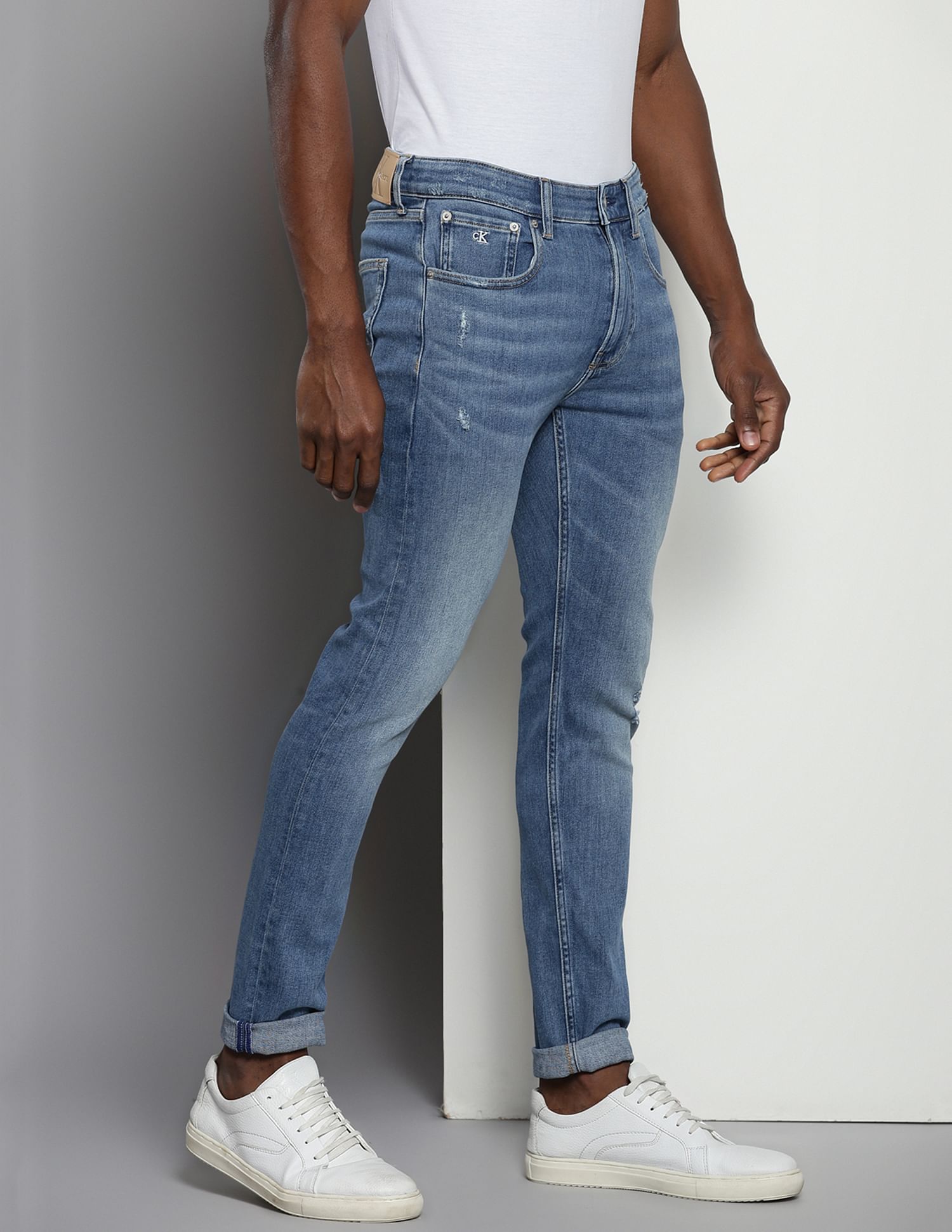 Calvin Klein Modern Tapered Fit Distressed Jeans