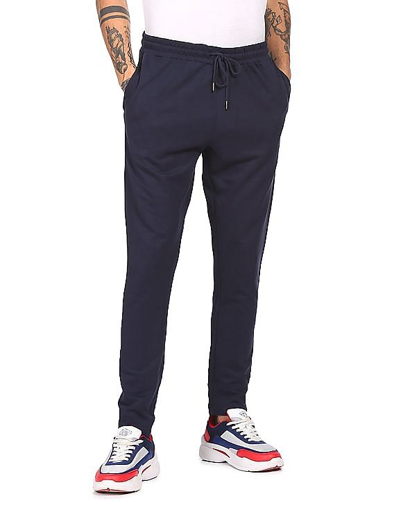 Buy Flying Machine Men Navy Blue Solid Slim Fit Track Pants With Side  Taping Detail - Track Pants for Men 18734040 | Myntra