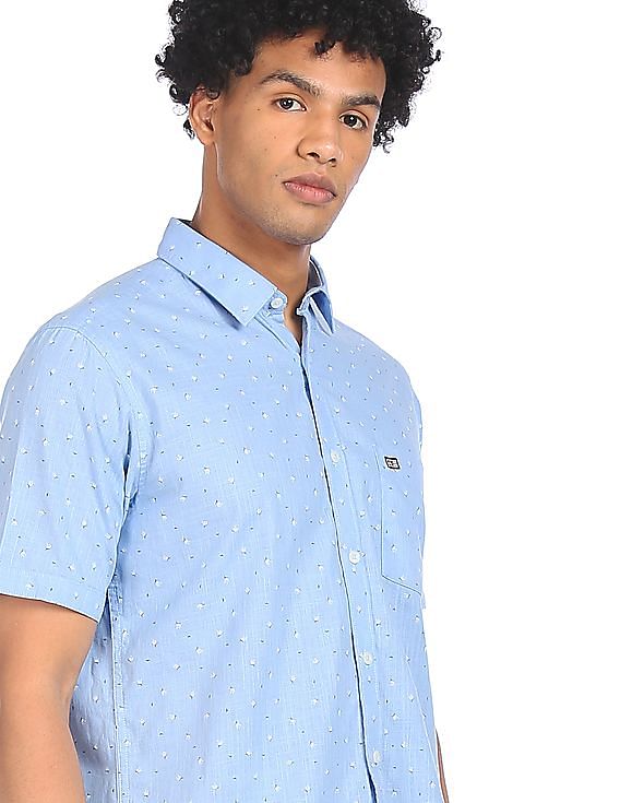 light blue short sleeve button up shirt