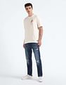 Flying Machine Mid Rise Slash Slim Tapered Jeans