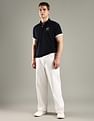 Tommy Hilfiger Solid Regular Fit Cotton Polo T-Shirt