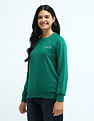 U.S. Polo Assn. Women Crew Neck Raglan Sleeve Solid Sweatshirt