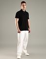 Tommy Hilfiger Solid Regular Fit Cotton Polo T-Shirt