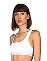 Calvin Klein Underwear Women White Elasticized Strap Logo Racerback Bra