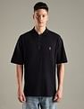 Tommy Hilfiger Solid Regular-Fit Cotton Polo Shirt