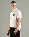 Tommy Hilfiger Solid Regular Fit Cotton Polo T-Shirt