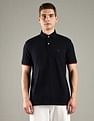 Tommy Hilfiger Solid Regular Fit Cotton Polo T-Shirt